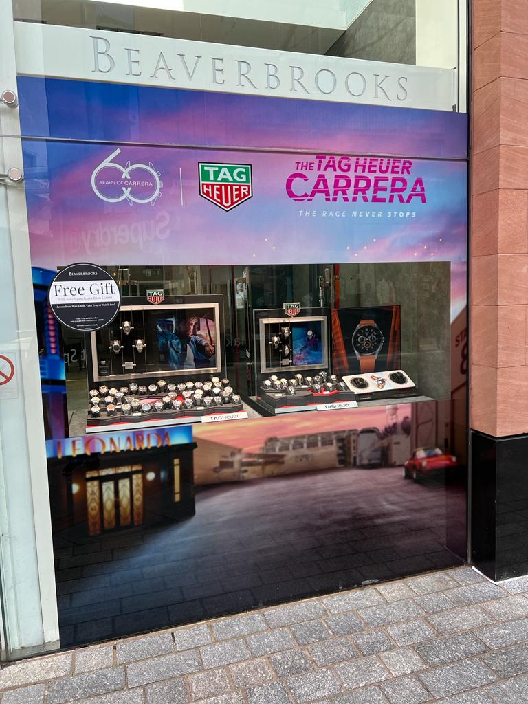 TAG Heur Carrera retail window graphics display