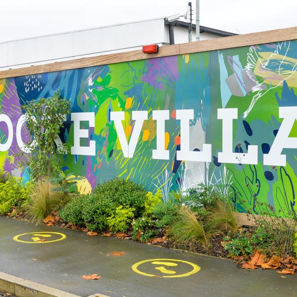 Kidbrooke Village Graphic Hoardings with plants