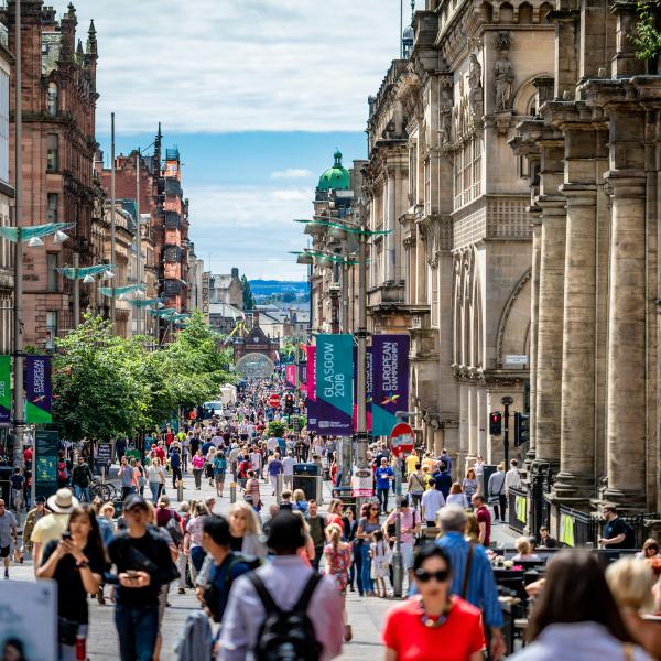 Busy high street with lots of shoppers